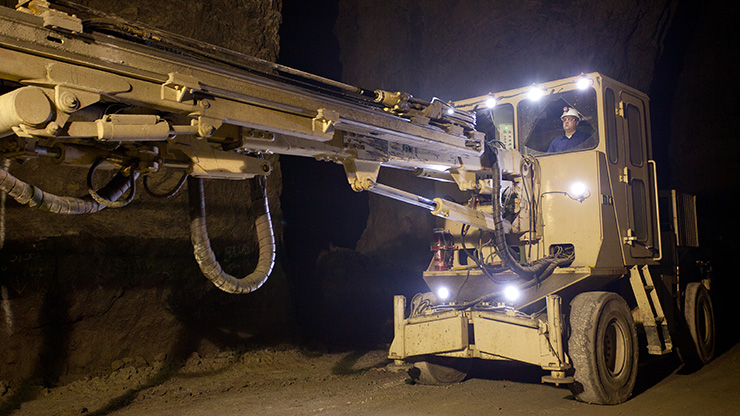 Large, mobile diamond drills like this one drill holes for explosives in Doe Run’s underground mineral mines.