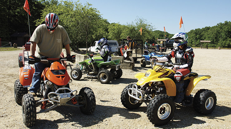 ATV enthusiasts riding their all-terrain-vehicles at St. Joe State Park, a remediated former mine site.
